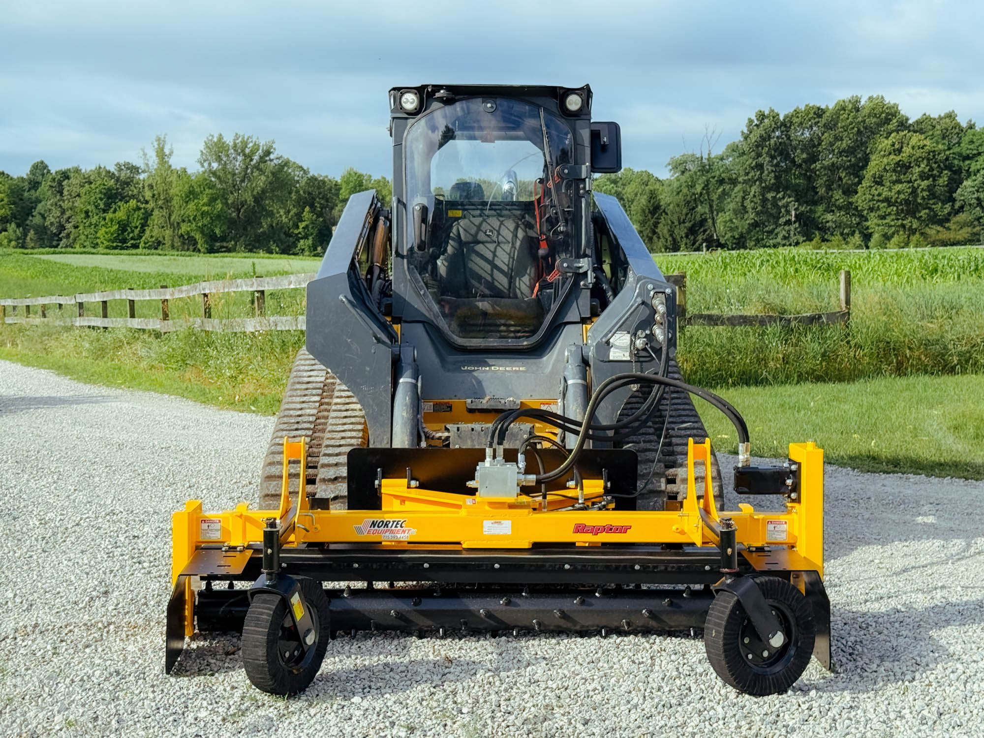 Front View of Nortec Raptor Power Rake for Skid Steers