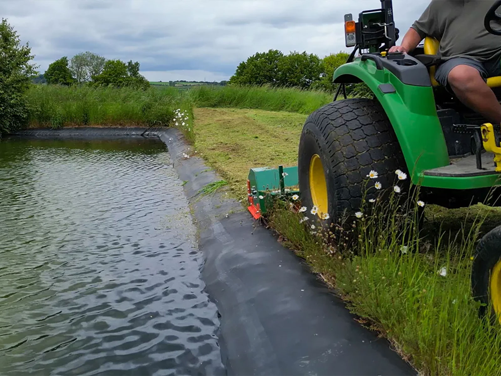 Mowing Pond Bank with Offset Flail Mower